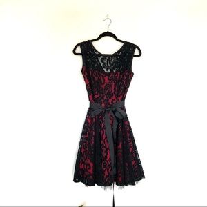 Red and black lace dress
